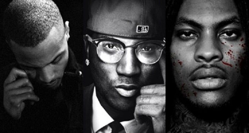 May include: Black and white photo of three men. The man on the left is looking down, the man in the middle is wearing a baseball cap and glasses, and the man on the right has blood on his face.