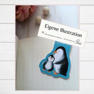 Magnetisches Lesezeichen „Pinguin Piet & Mama“
Diese Bookmarks mit Piet Pinguin und seiner Mama sind  ganz besondere Lesezeichen, die eine leise Botschaft zwischen deine Seiten tragen.

Das Lesezeichen - magnetisch, wurde mit eigener Illustration gestaltet und in liebevoller Herstellung gefertigt. Als besonderes Magnet Lesezeichen hält es deine Seiten sicher zusammen, als Geschenk Mama Geburtstag, 
eine besondere Muttertagsgeschenk Idee oder ein liebevolles kleines Zeichen für zwischendurch.