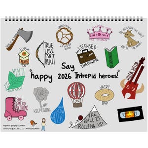 May include: A spiral-bound notebook with a gray cover featuring colorful illustrations and text. The illustrations include a pink roller skate, a hot air balloon, a goat, and a cassette tape. Text includes "Say happy 2026 Intrepid heroes!"