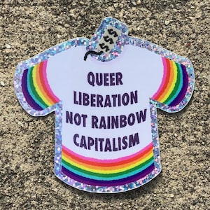 May include: A white t-shirt sticker with a rainbow design and the text "Queer Liberation Not Rainbow Capitalism".