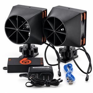 May include: Two black automotive horn units with circular grilles and orange accents, mounted on adjustable stands. Includes a black control box with an orange steering wheel logo, a power adapter, and a blue USB cable for electrical connectivity.