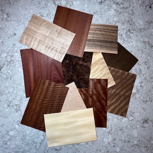 Exotic Highly Figured All Wood Veneer Sheets from around the world. 12 stunning sheets of premium wood veneers. Ships 1 day.