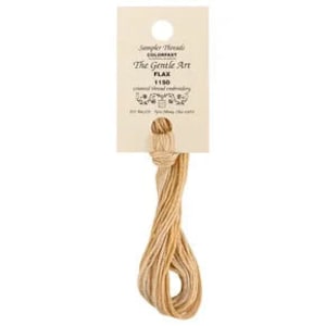 May include: A skein of flax thread in a light brown color. The thread is labeled "The Gentle Art Flax 4150" and is packaged on a white card with a floral design.