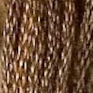 May include: Close-up of a brown and white woven fabric with a textured pattern.