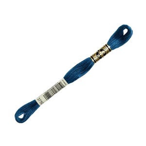 May include: A single skein of DMC embroidery floss in a deep teal color. The floss is tightly wound and features a label with the number 3750. The label also includes the DMC logo and other product information.
