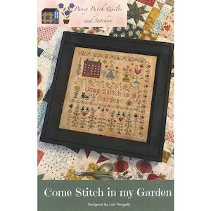 May include: A cross stitch pattern featuring a colorful garden scene with a house, flowers, and a cat. The pattern is titled "Come Stitch in my Garden" and is designed by Lori Pengelly.