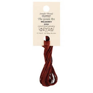 May include: A skein of Mulberry coloured embroidery floss, labelled "Sampler Threads Colorfast The Gentle Art Mulberry 0350 counted thread embroidery PO Box 670 New Albany, Ohio 43054"
