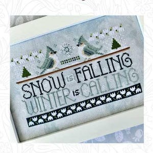 May include: Cross stitch pattern featuring two bluebirds with the text "Snow is Falling Winter is Calling". The pattern is from Sweet Wing Studio and is part of the WordyBirds collection for January.