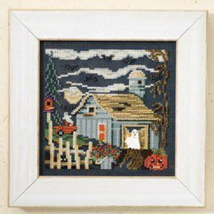 May include: A cross-stitch pattern featuring a spooky farmhouse with a ghost, pumpkins, and bats against a dark blue background.