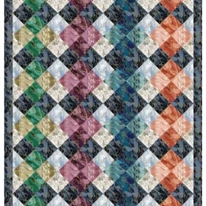 May include: A colorful quilt with a diamond pattern. The quilt features diamonds in shades of green, pink, orange, blue, and white, set against a dark background. The quilt has a dark blue border.