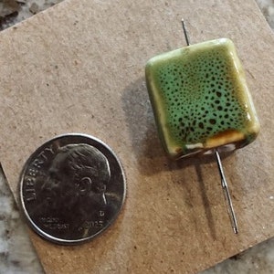 Needleminder- Green Clay with Black Specks w/needle hole
