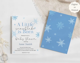 Puede incluir: Una invitación de baby shower azul y blanca con copos de nieve y el texto "A Little Snowflake is Born". La invitación incluye la fecha, la hora, la ubicación y la información de RSVP.