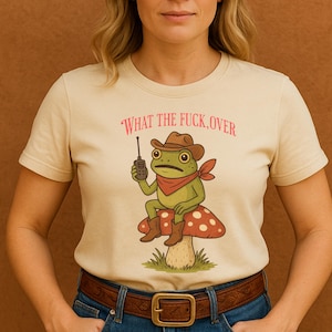 Cowboy Frog on Mushroom Shirt – “What the f*ck, over” Funny Retro Western Cottagecore Tee.