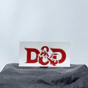 DnD Vinyl Decal Sticker – Inspired by Dungeons and Dragons and DnD Logos – Great Gift for TTRPG Fans – Multiple Sizes and Colors
