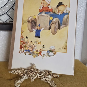 Mabel Lucie Attwell wydrukowała ulotki artystyczne, które trzymała w domu, jako wystrój pokoju