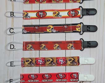 Professional Football Pacifier Clip/ Baby shower gift/fabric pacifier clip / handmade baby present /