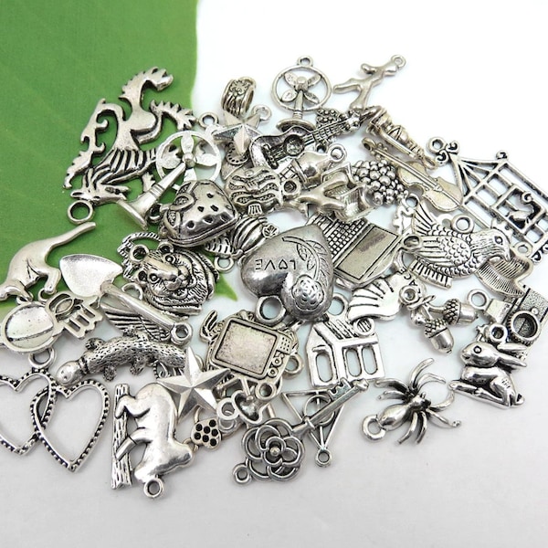 Grab bag, lot of 50 mixed charms, antique silver collection