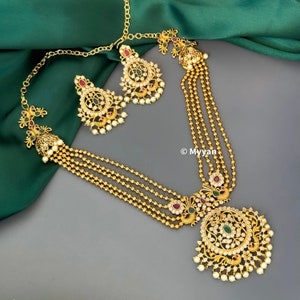 Collier Gutapusallu de l'Inde du Sud : parure de bijoux en rubis, pierre verte et paon