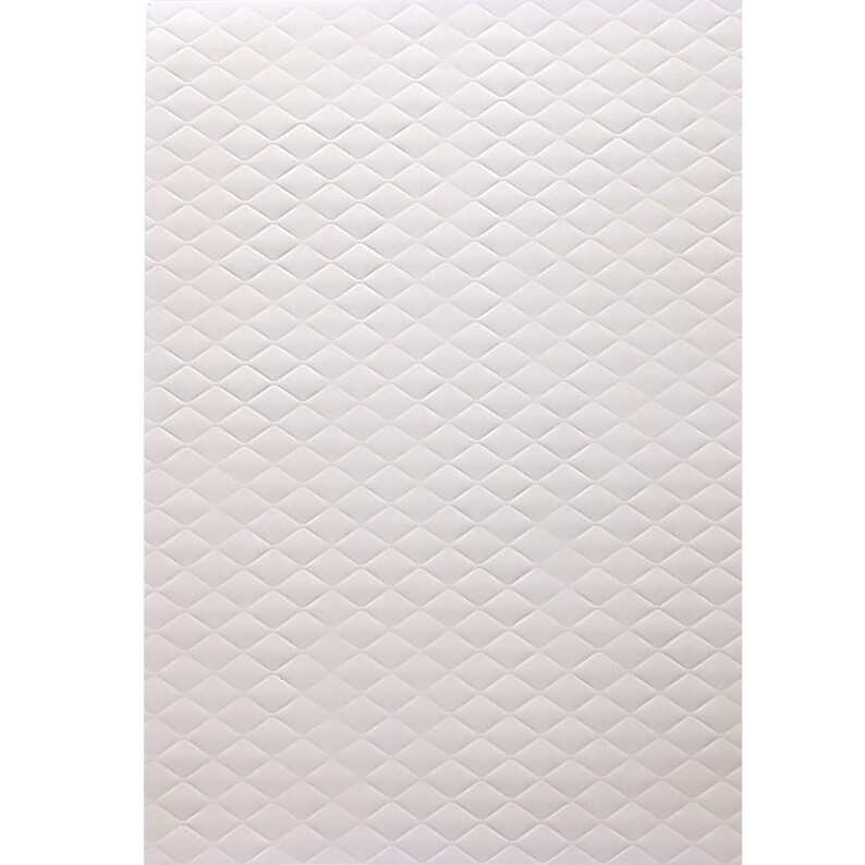 May include: White textured paper with a repeating diamond pattern.