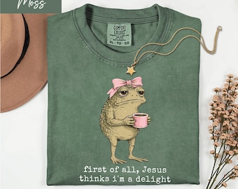 First of All Jesus Thinks I'm A Delight Frog Meme T-Shirt, Sarcastic Frog Meme Top, Sassy Frog with Pink Bow Shirt, Frog Jesus Top
