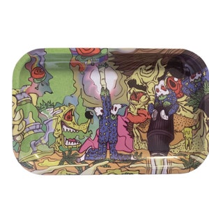 May include: A rectangular metal rolling tray with a colorful, psychedelic design featuring cartoon characters, plants, and abstract shapes. The tray has a green, yellow, pink, and blue color scheme.