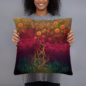 May include: A decorative throw pillow with a colorful abstract design featuring a tree with red, orange, and yellow flowers. The background is a dark purple with green accents.