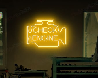 May include: A yellow neon sign in the shape of a car engine warning light with the text "CHECK ENGINE" in a dark garage setting.