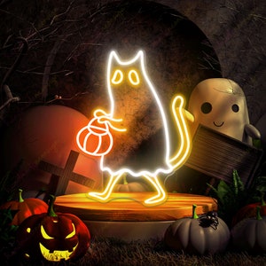 May include: A neon sign of a white ghost cat holding a pumpkin, with a yellow glow. The sign is on a wooden platform with a gray pumpkin and a spider in the foreground.