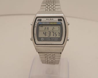 Orologio da uomo vintage SEIKO ALBA Y770-5080 Chrono Digital Quartz W220 *FUNZIONANTE