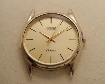 SEIKO Chronos 8121-8000 analog kvarts herrklocka med vintageurtavla W390 *Säljs i befintligt skick