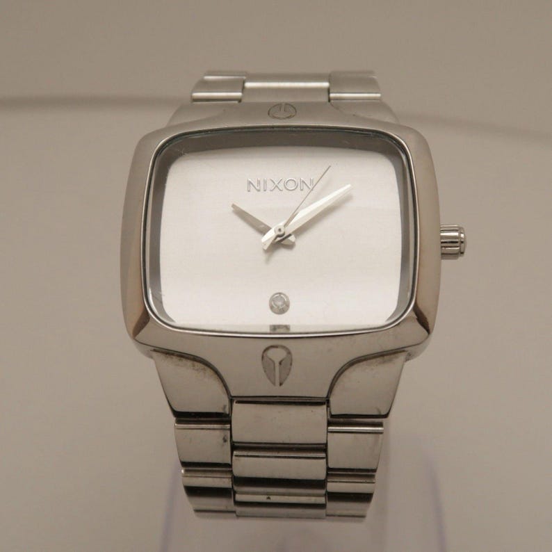 NIXON Sí, es auténtico reloj analógico de cuarzo vintage de acero inoxidable W215 *FUNCIONANDO imagen 1