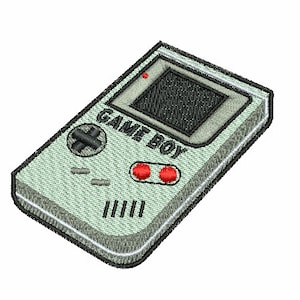 May include: A gray and black Game Boy handheld video game console with a red button on the front. The screen is black and the text "GAME BOY" is printed on the front.