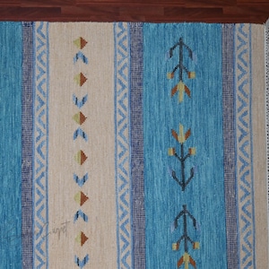 Handwoven kilim rug, blue beige rug, with tribal geometric motifs; flatweave wool carpet with fringe for boho ethnic decor.
