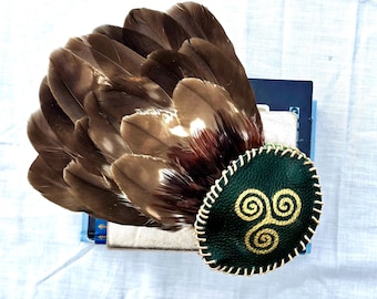 Sacred Scottish Hawk feather prayer fan. Leather handle with hand painted gold Triskellion motif.