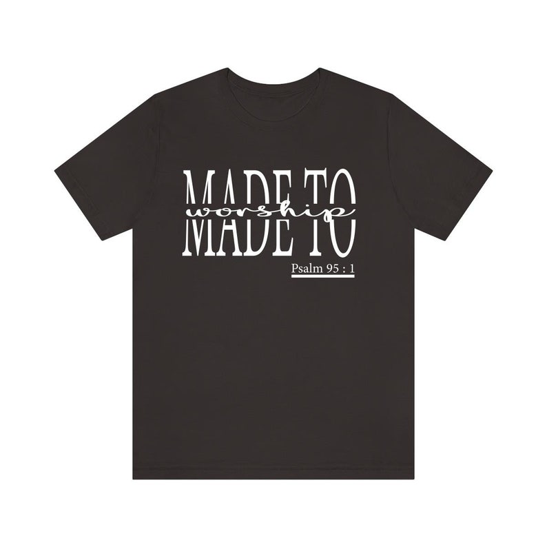 May include: Black t-shirt with white text that reads "MADE TO worship MADE TO" and "Psalm 95:1".