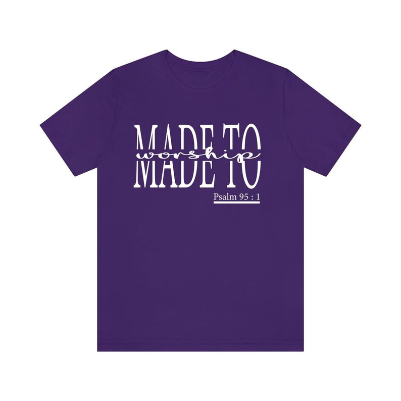 May include: Purple t-shirt with white text that reads "MADE TO worship MADE TO" and "Psalm 95:1".