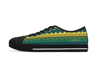 May include: Black canvas low-top trainers with a green and gold geometric pattern. The pattern features a repeating design of overlapping shapes. The shoes have a white stripe around the sole and the text "KGPA" is printed on the side.