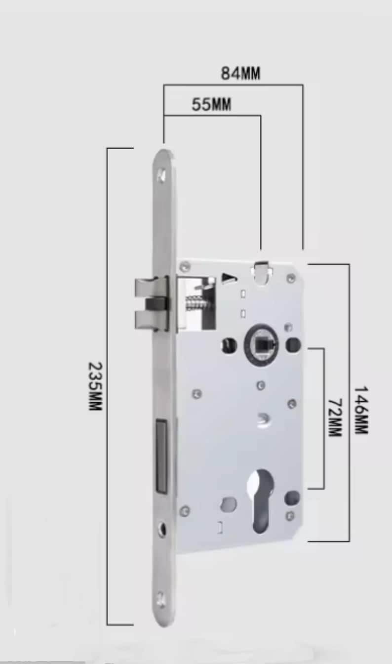 May include: A silver door lock with a keyhole and a latch. The lock is 146 mm tall, 72 mm wide, and 235 mm long.