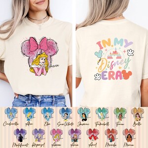 Puede incluir: Una camiseta blanca con un dise&ntilde;o de orejas de Mickey Mouse rosa y blanco con una princesa de Disney. La parte posterior de la camiseta tiene un gr&aacute;fico colorido que dice "In My Disney Era".