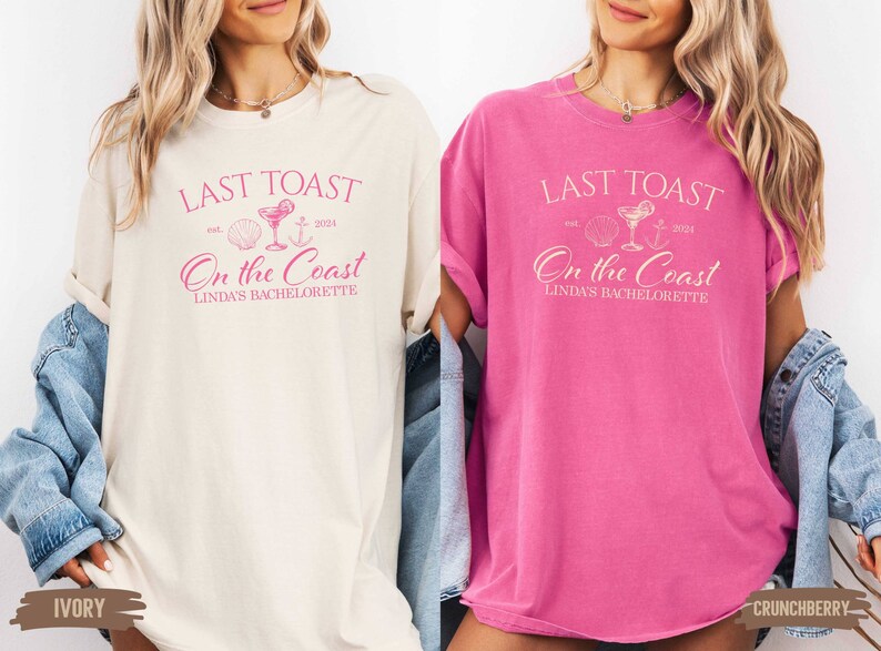 May include: Two t-shirts with the text "Last Toast On the Coast Linda's Bachelorette" in pink lettering. The shirts are in ivory and crunchberry colors.