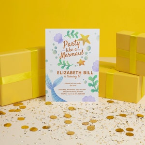 May include: A mermaid-themed birthday party invitation with a blue and green watercolor illustration of a mermaid tail, seaweed, and seashells. The text reads "Party like a Mermaid" and "Elizabeth Bill is turning 6!"