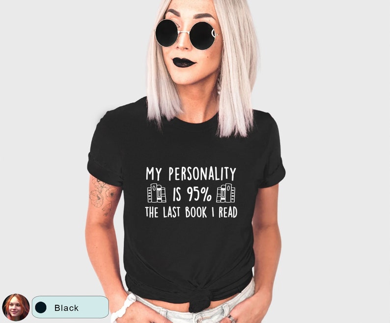 May include: Black t-shirt with white text that reads "My personality is 95% the last book I read".