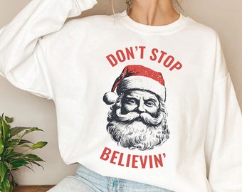 No dejes de creer sudadera, suéter vintage de Navidad de Papá Noel, divertido cuello redondo de invierno, sudadera de fiesta de Navidad para adultos, regalo de vacaciones de invierno