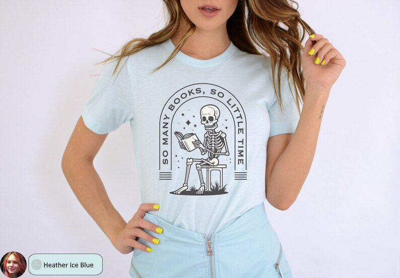 May include: A light blue t-shirt with a graphic of a skeleton reading a book. The graphic is surrounded by a circle with the text "So many books, so little time".