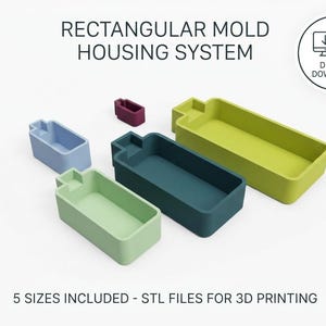 Pode incluir: Um download digital para um sistema de caixa de molde retangular com cinco tamanhos distintos em verde claro, verde escuro, azul, azul claro e roxo. O conjunto inclui arquivos STL para impressão 3D, conforme indicado no texto da imagem.