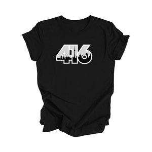 May include: Black t-shirt with a white graphic of the number 416 with a cityscape silhouette inside the numbers.