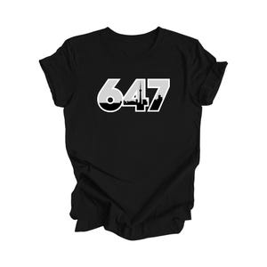 May include: Black t-shirt with a white graphic of the number 647 with a skyline silhouette inside the numbers.