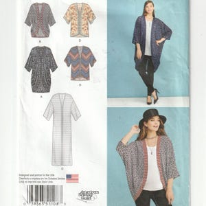 May include: A sewing pattern envelope featuring illustrations of various open-front kimonos and cardigans with diverse patterns, including geometric and floral designs. The package displays finished garments on models, showing different lengths and sleeve styles.