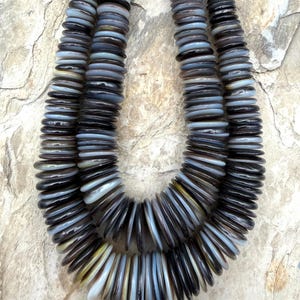 Black and white mother of pearl big graduated disc beads 7-20mm, one 16 inch strand