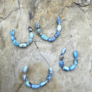 Rare aaa+ golden hills turquoise (kazakhstan) graduated handcut rice beads 4x7-5x9mm, set of 7 beads